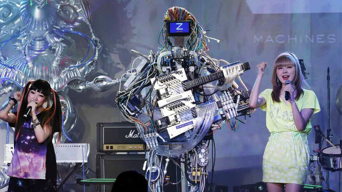 Японці створили рок-групу з роботів - фото 1