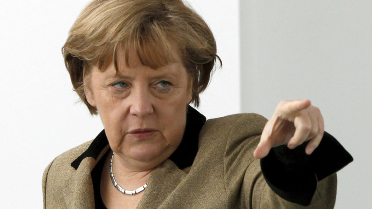 Меркель хоче особисто поговорити з Януковичем у Литві - фото 1