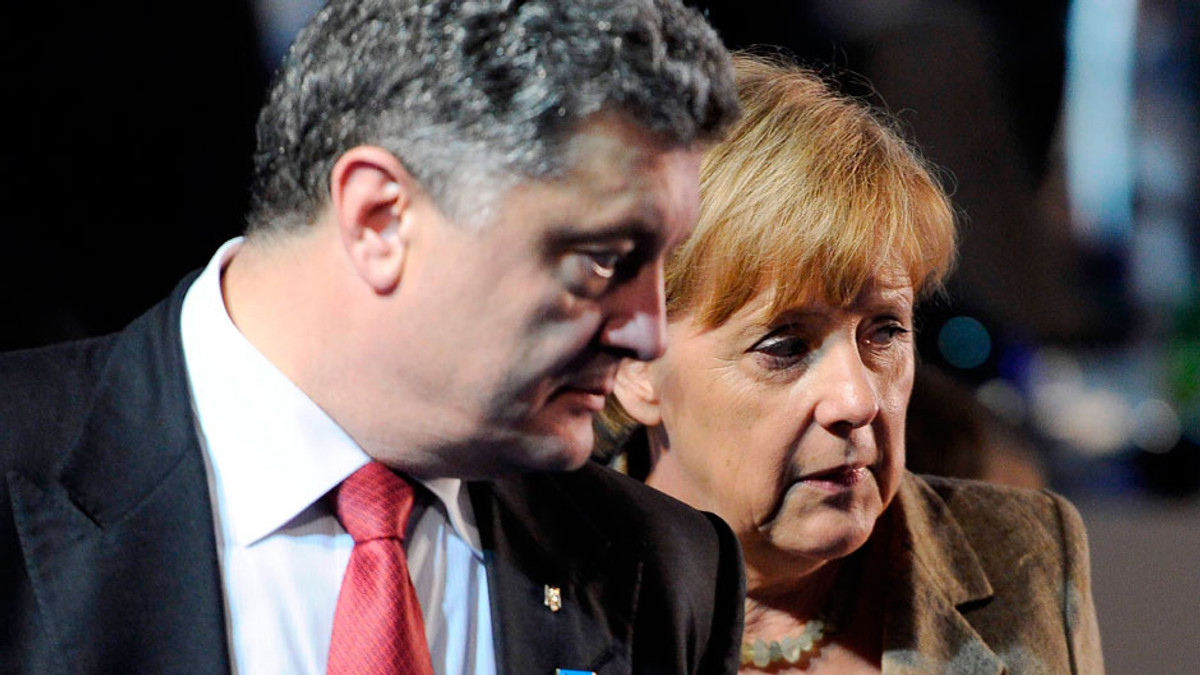 Порошенко і Меркель засудили порушення перемир’я на Донбасі - фото 1