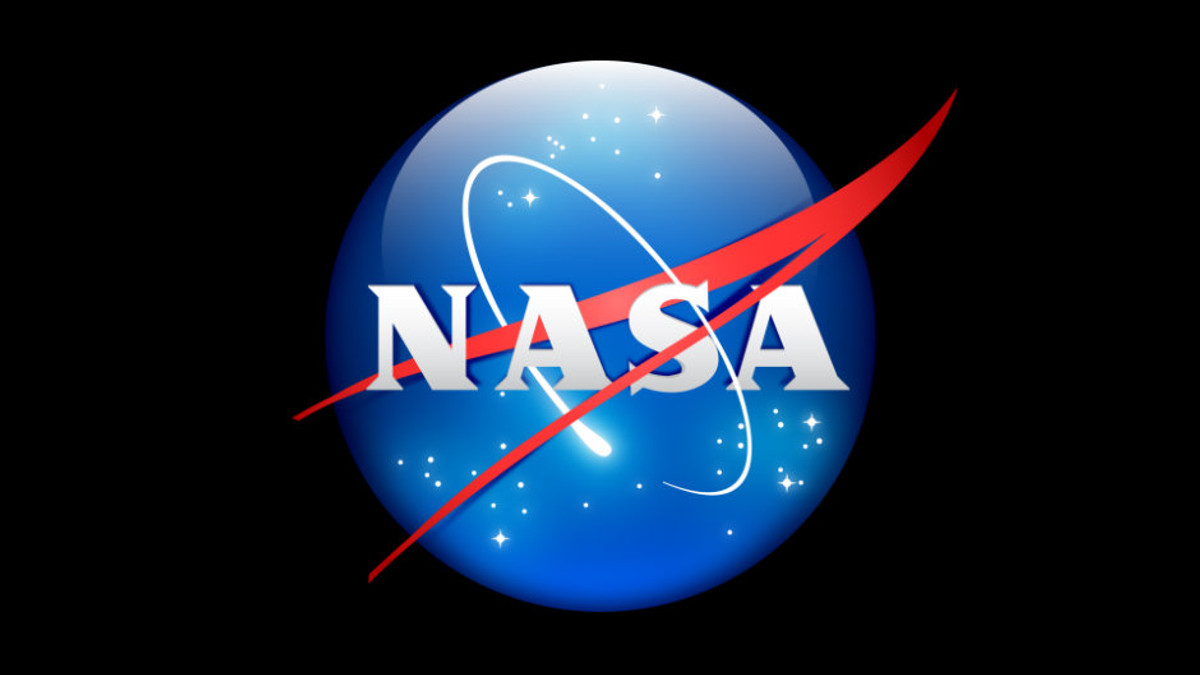 NASA показало кольоровий знімок пустель Плутона - фото 1