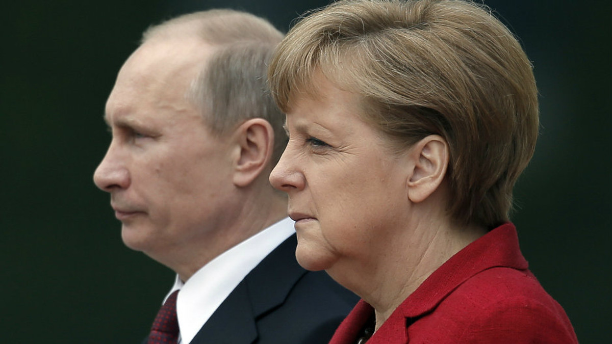 Росіяни вибрали Путіна і Меркель «людьми року» - фото 1