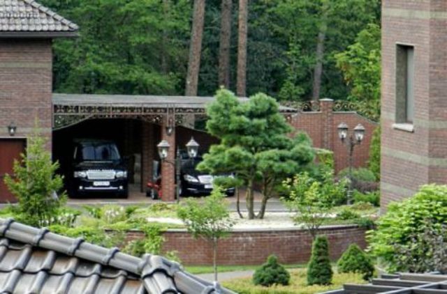 Суд взяв під арешт будинок екс-заступника Пшонки Кузьміна - фото 98349