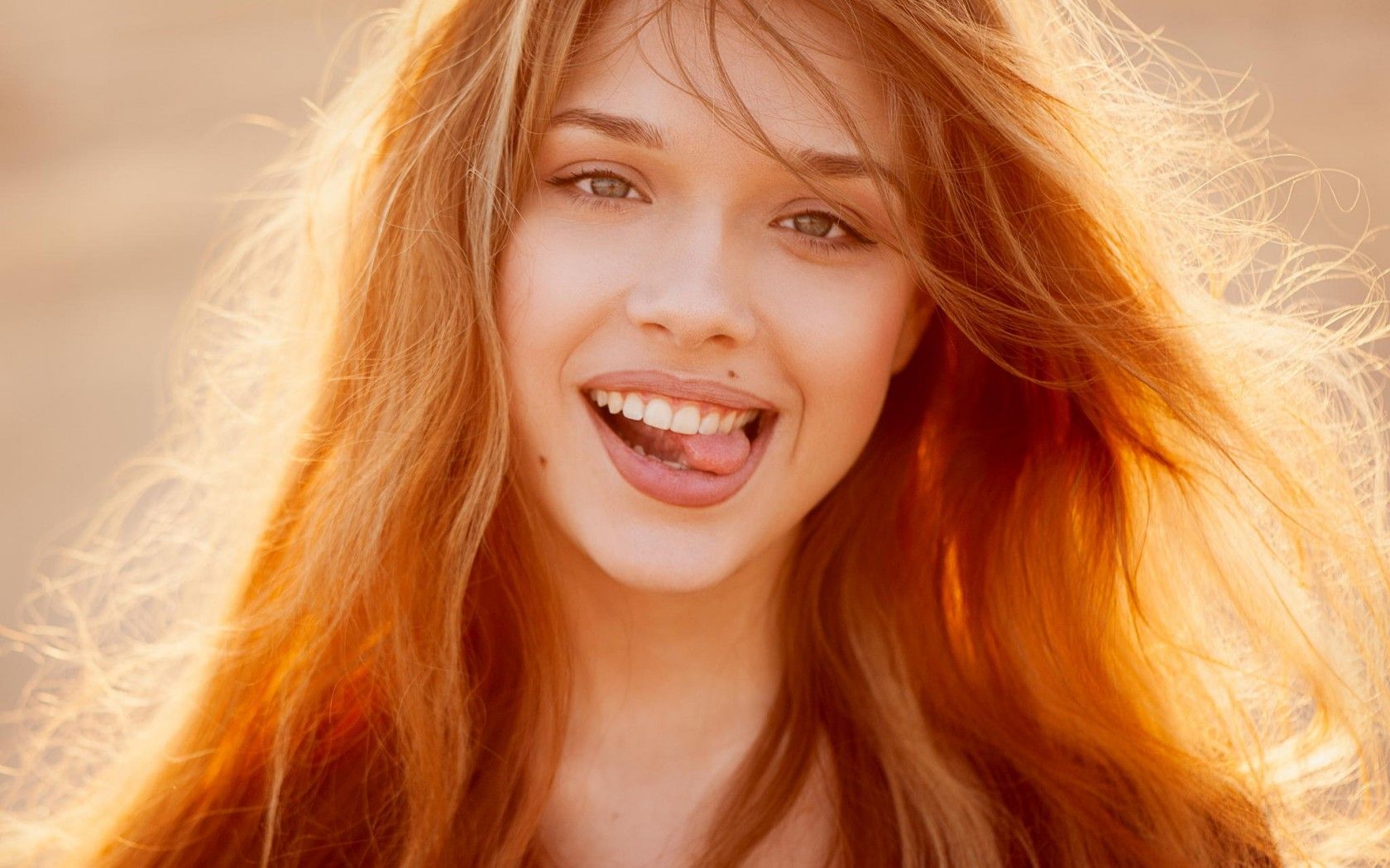 Вчені з'ясували, що змушує жителів деяких країн частіше посміхатися