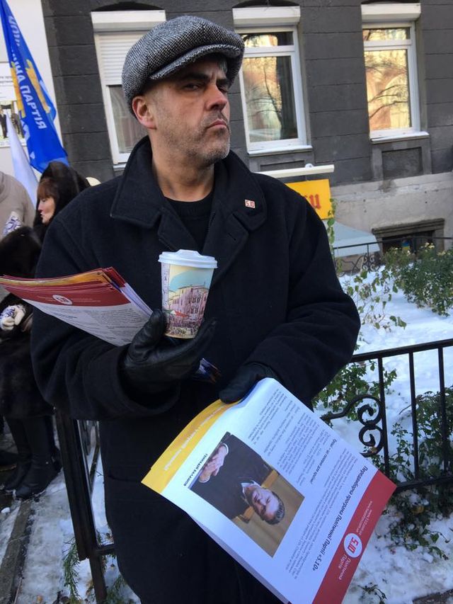 Протести в Києві в обличчях: фоторепортаж - фото 118676