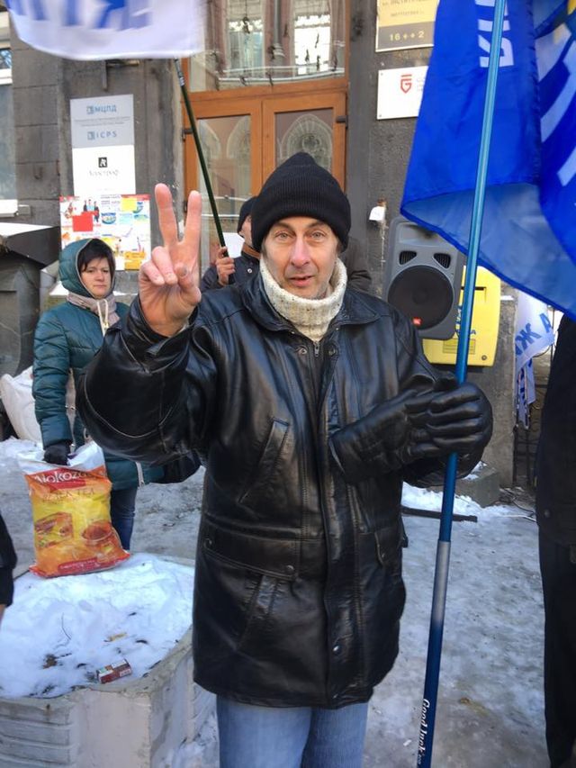 Протести в Києві в обличчях: фоторепортаж - фото 118678