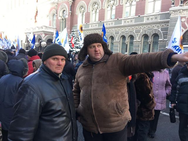 Протести в Києві в обличчях: фоторепортаж - фото 118675