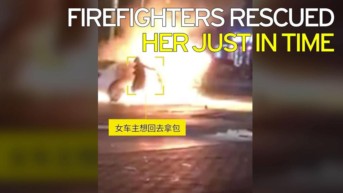 Стильна китаянка "рятувала" дизайнерську сумку з палаючого авто - фото 1