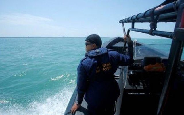 облизу Малайзії перекинувся човен з мігрантами: 9 загиблих - фото 1