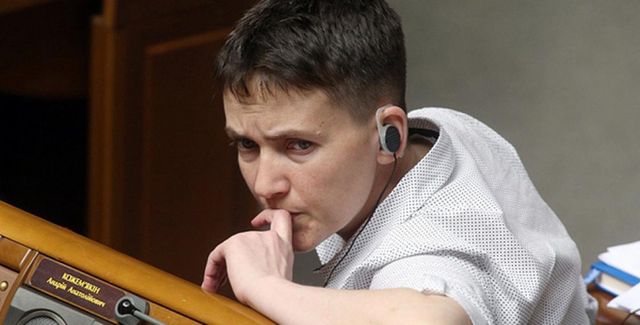 Переговори терористів та недоторкана Савченко: 21 лютого в трьох фото - фото 145095