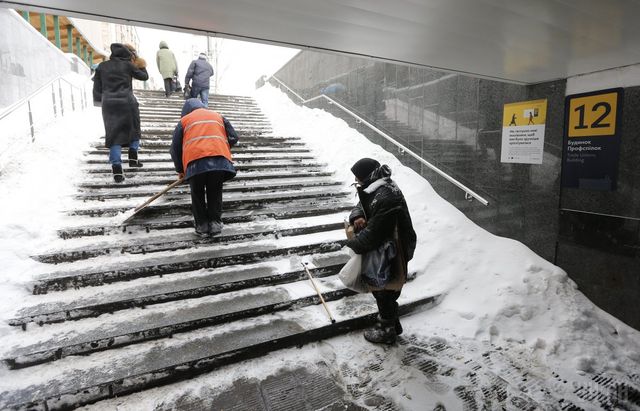 Сніг, що налякав Кличка: фото негоди в Києві - фото 140228