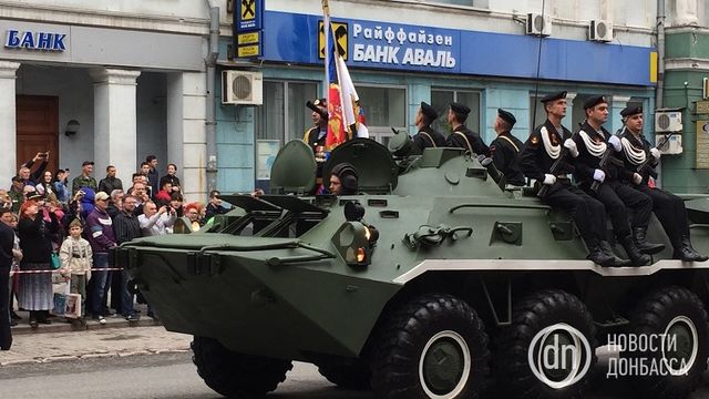 Як проходить 9 травня в окупованому Донецьку: фоторепортаж - фото 165329