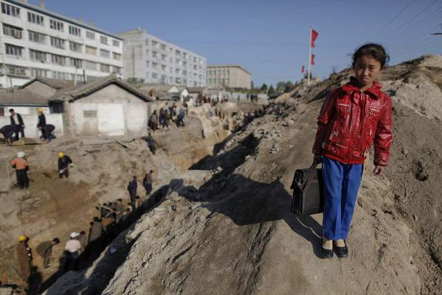 Як живуть діти в Північній Кореї: шокуючі фото - фото 168000
