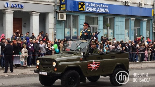 Як проходить 9 травня в окупованому Донецьку: фоторепортаж - фото 165325