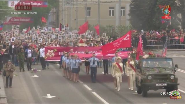 Як проходить 9 травня в окупованому Донецьку: фоторепортаж - фото 165327