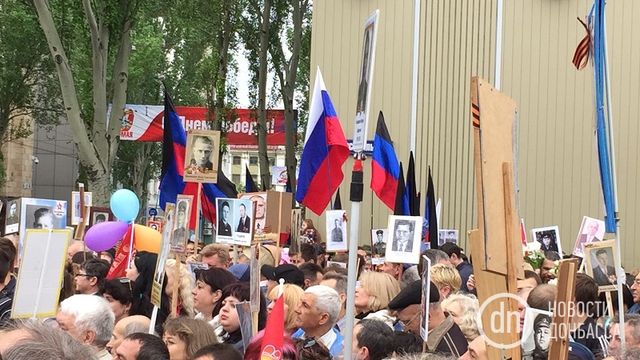 Як проходить 9 травня в окупованому Донецьку: фоторепортаж - фото 165322