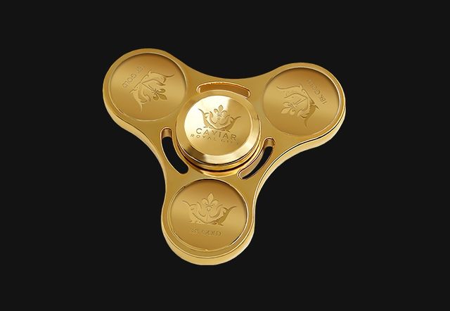 Улюблені ювеліри Путіна випустять спіннер із золота - фото 178858