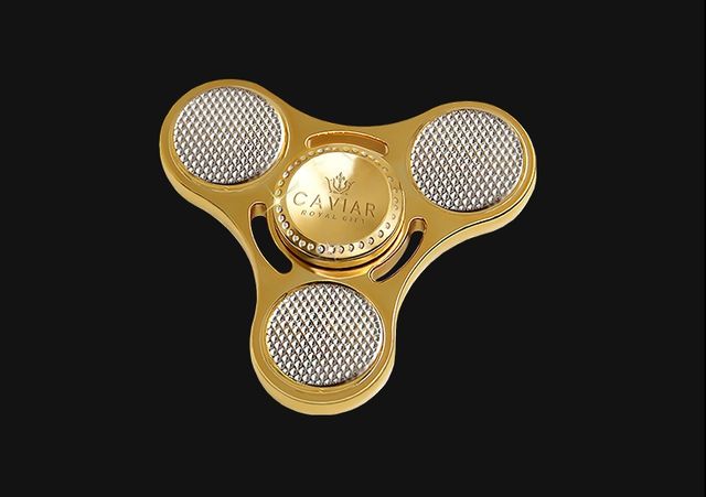 Улюблені ювеліри Путіна випустять спіннер із золота - фото 178857