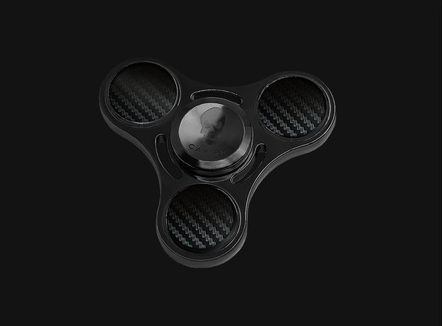 Улюблені ювеліри Путіна випустять спіннер із золота - фото 178856