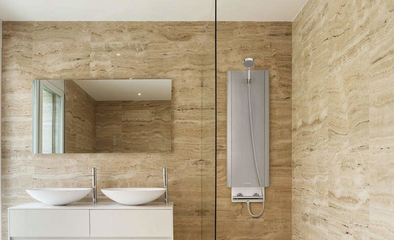 Представлена ​​система, яка зберігає воду в душі теплою