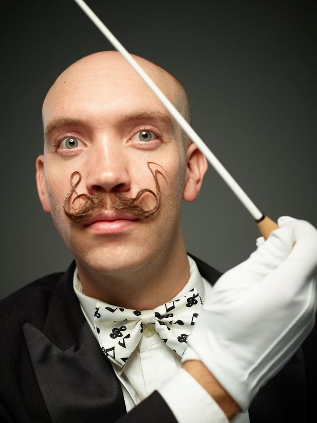 Найкрутіші чоловіки на Чемпіонаті світу борід та вусів: ефектні фото - фото 198844