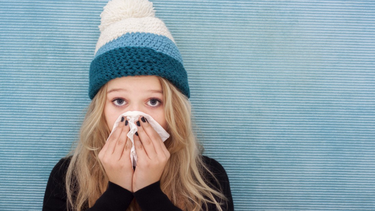 Зазвичай симптоми грипу проявляються в різкому підвищенні температури - фото 1