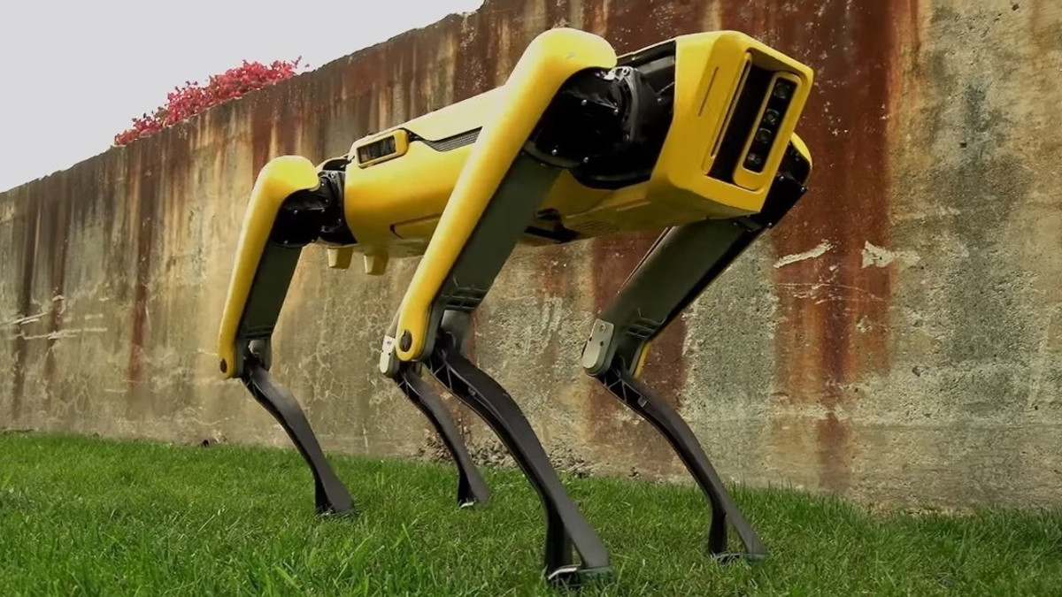 Робот-собака від Boston Dynamics навчився відкривати двері - фото 1