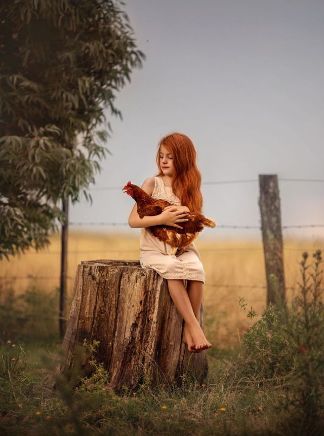 Рудоволоса дівчинка і тварини: казкові фото - фото 252171