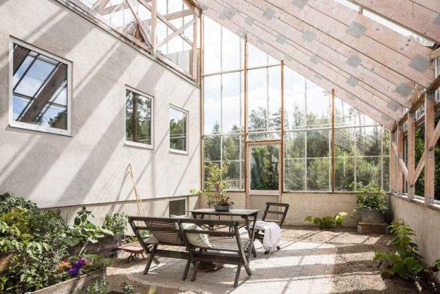 Оригінальний будинок, побудований усередині оранжереї- фото 256667