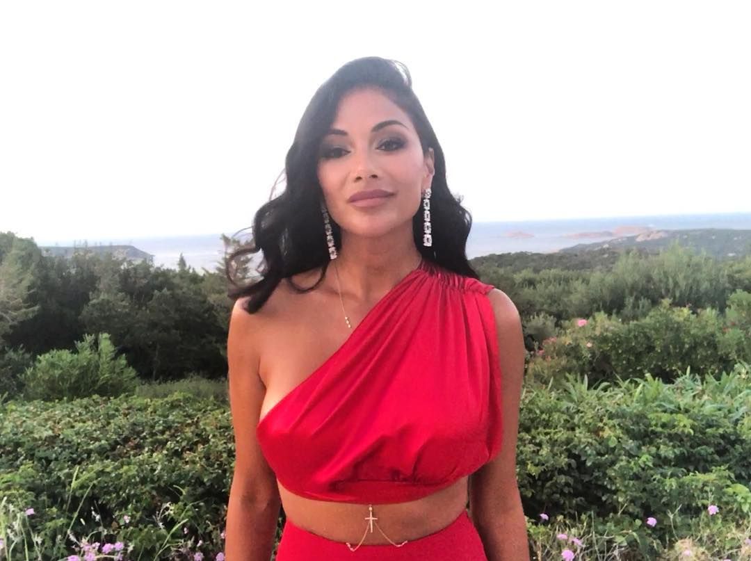 Ніколь Шерзінгер показала ідеальну фігуру в купальнику - фото 1