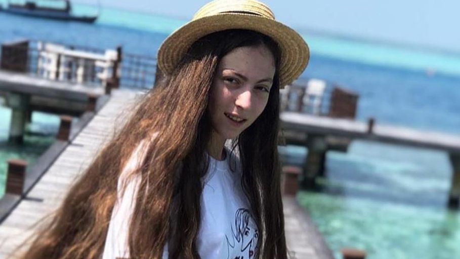 Діти Полякової весело позували в океані - фото 1