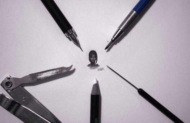 Американець створює мініатюрні малюнки з безліччю деталей - фото 299083