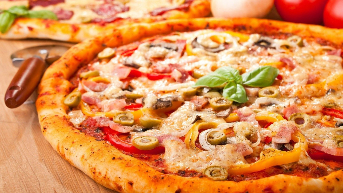 Користь піци пов'язана з поміркованістю її вживання - фото 1