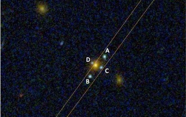 Hubble зняв у космосі дивовижний 'хрест Ейнштейна' - фото 315304