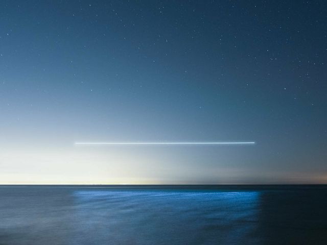 Американець малює у небі за допомогою квадрокоптера: ефектні фото - фото 316253