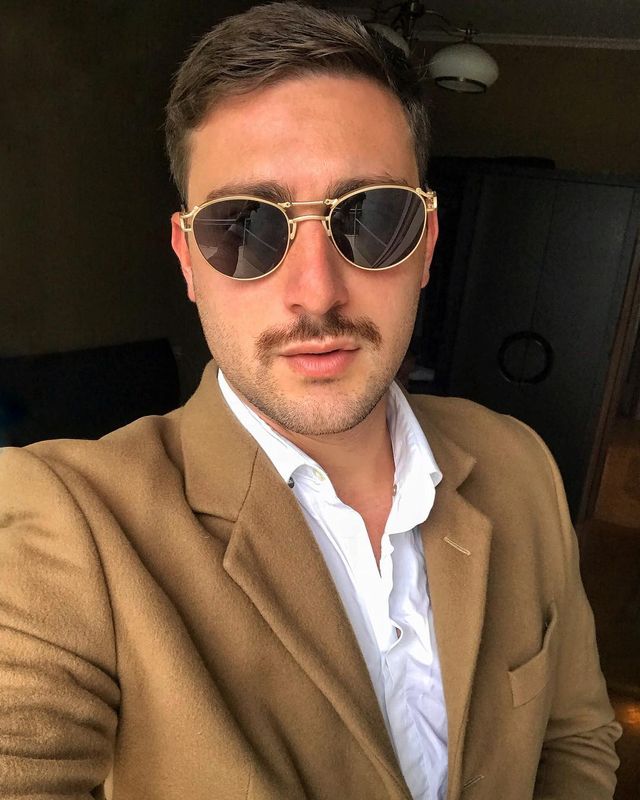 Як носити чоловічі сонцезахисні окуляри: правила етикету та трендові оправи - фото 329107