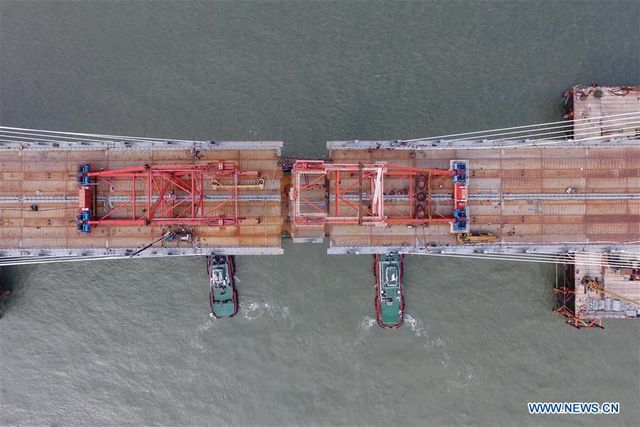 У Китаї побудували найдовший у світі міст: вражаючі кадри - фото 357330