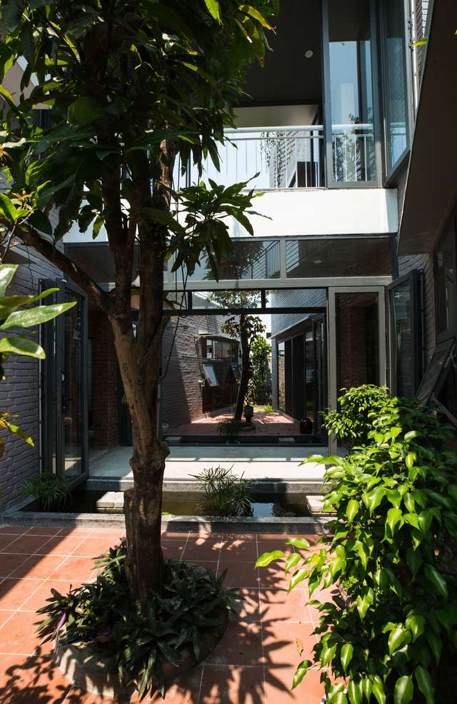 У В'єтнамі створили ідеальний дім, де кожен з сім'ї живе окремо - фото 360483