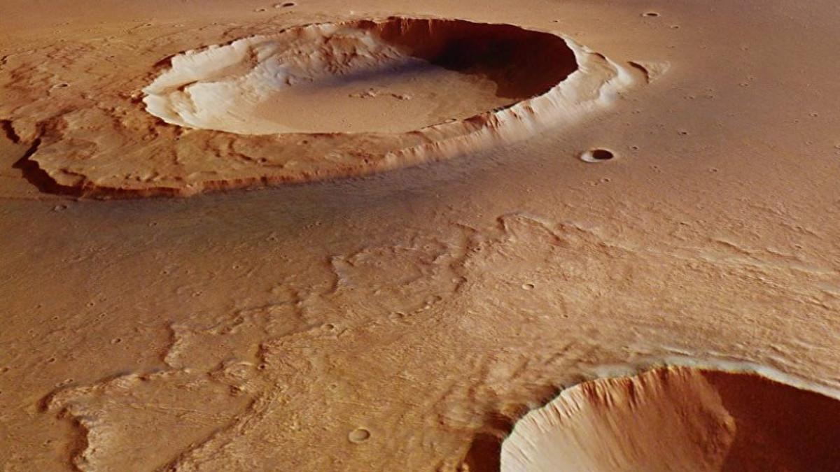 Орбітальний зонд зробив приголомшливий знімок крижаного кратера на Марсі - фото 1