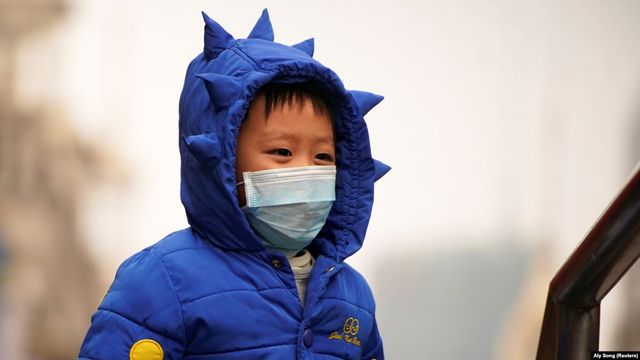Як у Китаї захищаються від коронавірусу: фоторепортаж - фото 386568