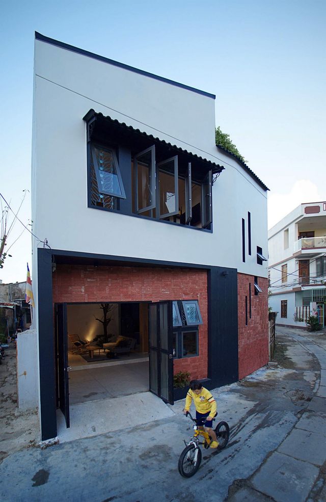 У В'єтнамі звели сучасний дім для любительки ромашок: ефектні фото - фото 390832