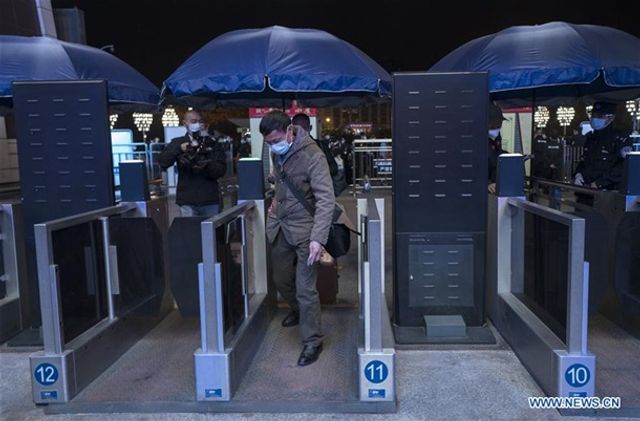 Як Ухань повертається до життя після карантину: фоторепортаж - фото 397088