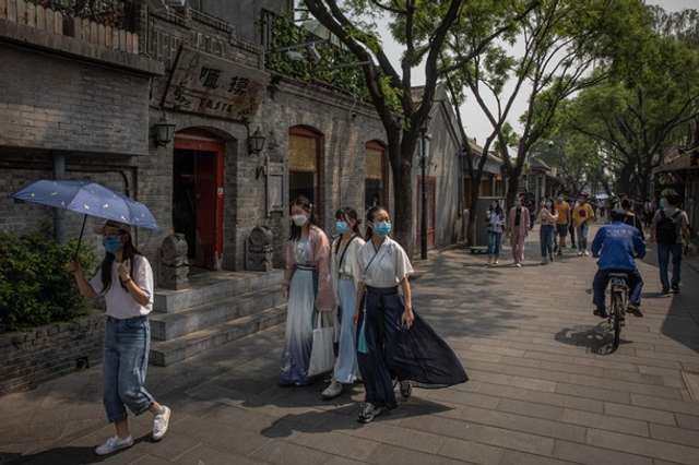 У Китаї знову дозволили туризм і подорожі - фото 401485