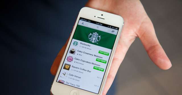 Мережа Starbucks відмовляється від готівкового способу оплати - фото 402708