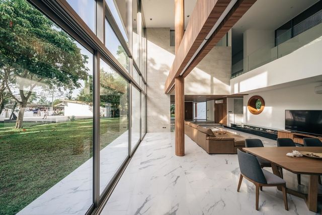 Як виглядає сучасний дім сім'ї рибалок у Таїланді: ефектні фото - фото 403889