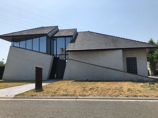 Потворна бельгійська архітектура, яка дивує: епічні фото - фото 414103