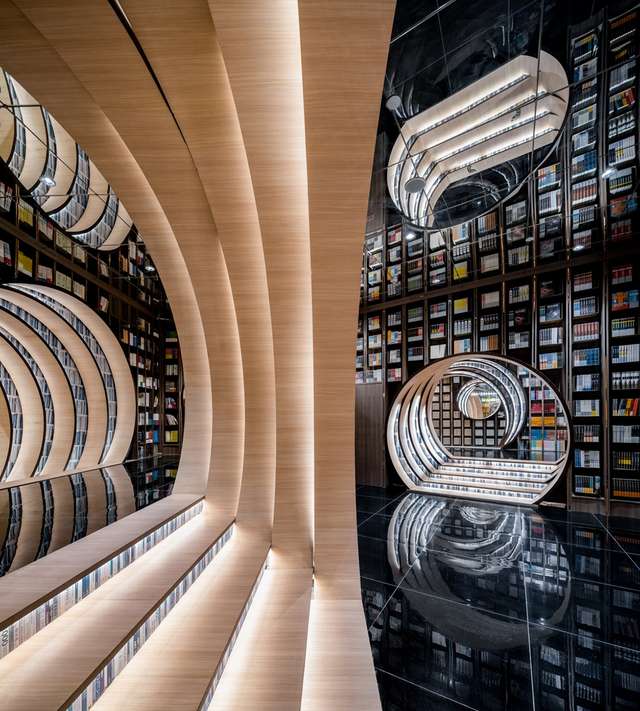 Книголюби оцінять: дивіться, як виглядає футуристична книгарня у Пекіні - фото 415202