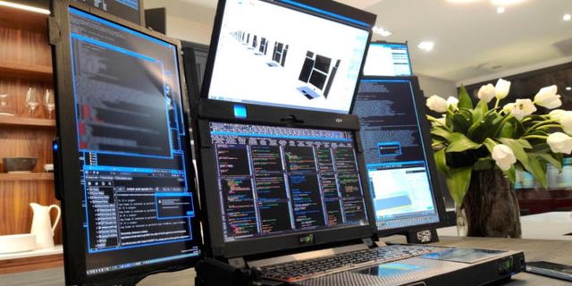 Представлено прототип ноутбука з сімома екранами: вага девайса вас здивує - фото 447172