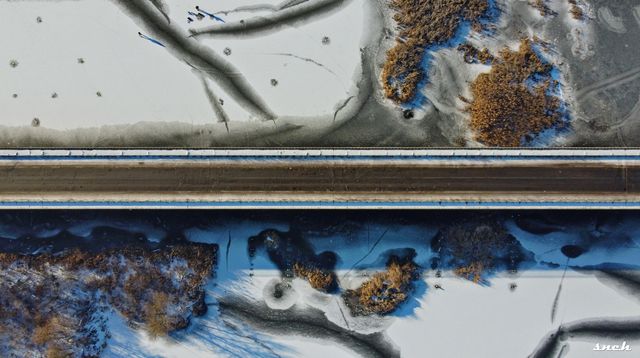 Фотограф показав крижане озеро на Чернігівщині з висоти пташиного польоту: видовищні кадри - фото 491684