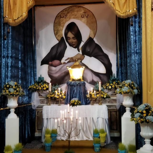 Картина 'Мадонна в метро' стала фрескою в одному з храмів Неаполя - фото 503616