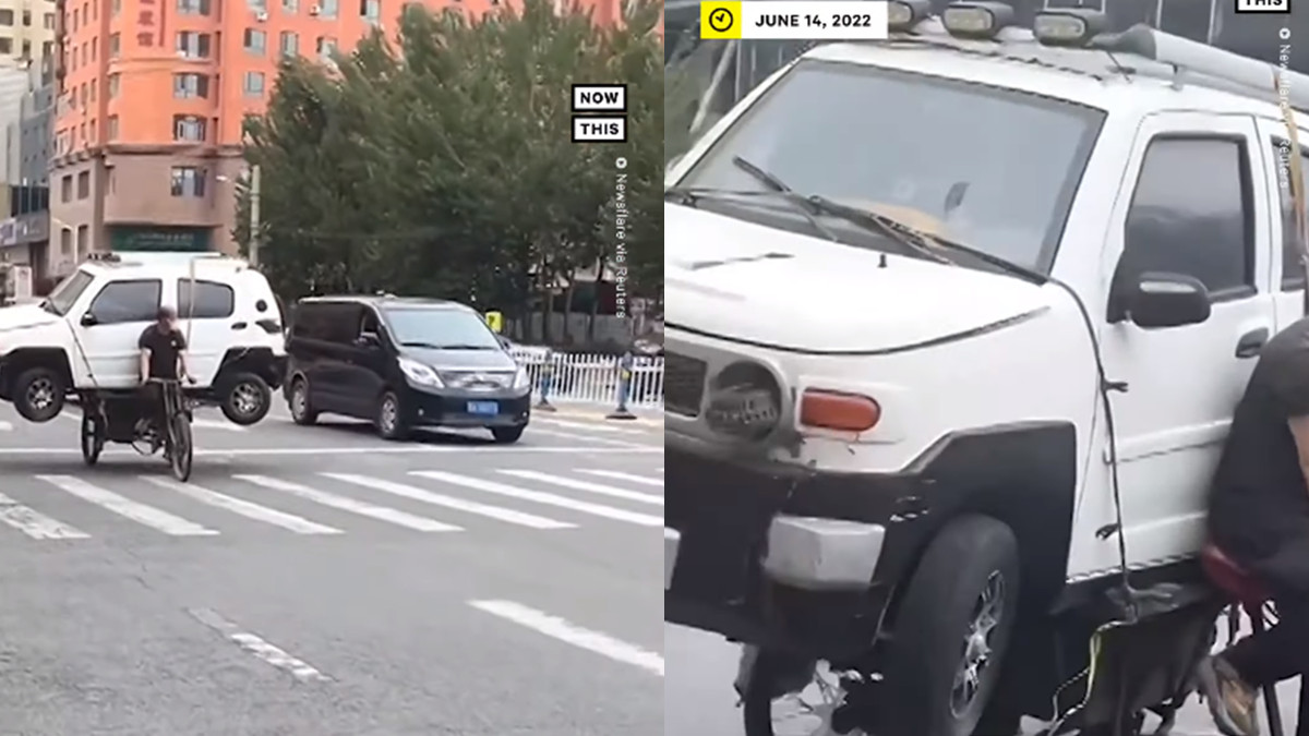 Житель Китаю перевіз машину просто на велосипеді: епічне відео - фото 1